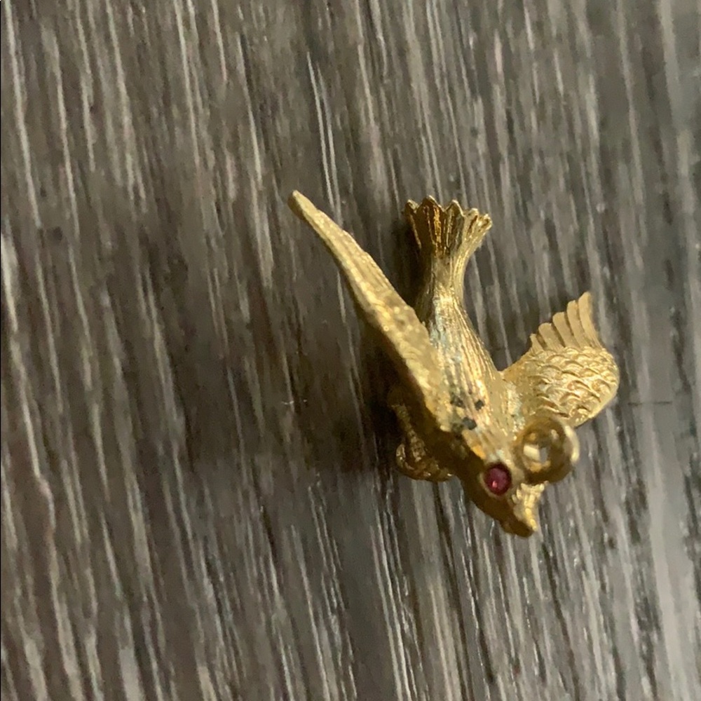 Gold bird necklace charm